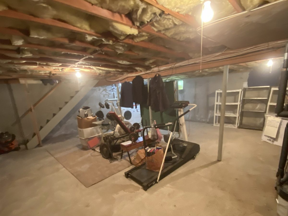 Basement with the clutter removed and open floor space after the cleanout