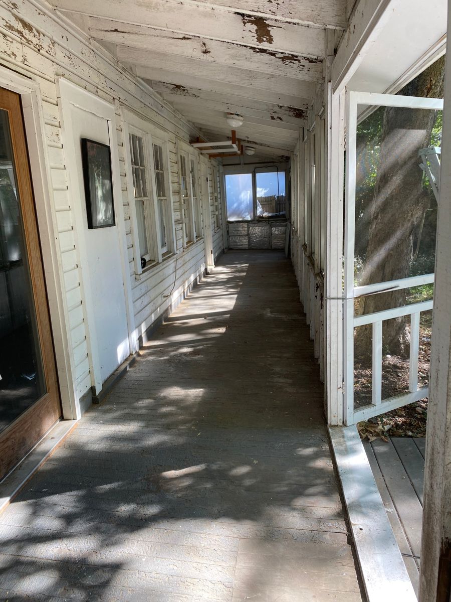 Empty, clean porch floor after the cleanout